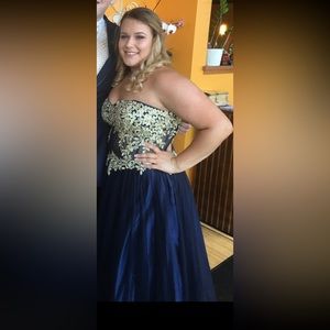 Navy blue and gold strapless corset prom gown